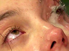Cum on the chicks eyes looks very sexy and hot