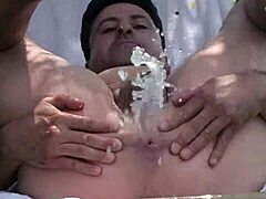 Extreme enema with outdoor gardenhose and asshole play