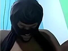 Masked BDSM slave experiences selfclamping in video